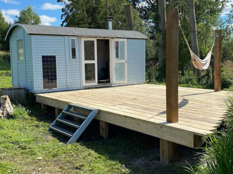 Wooden decking built with scaffold boards installed in Hampshire.